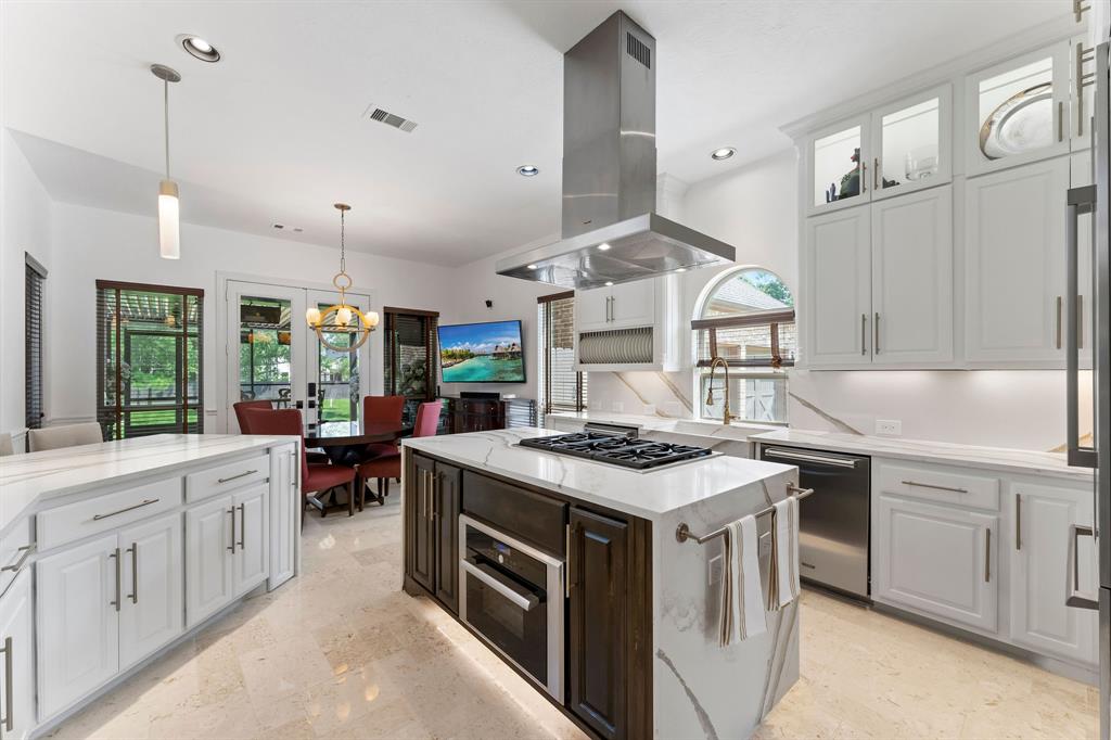 The steamer oven is conveniently located in the island. This kitchen also has plenty of storage with the convenience of drawers in the lower cabinets.