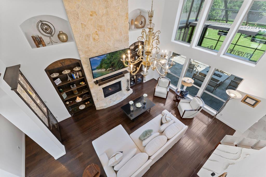 A view of the Murano glass chandelier and living room from upstairs.