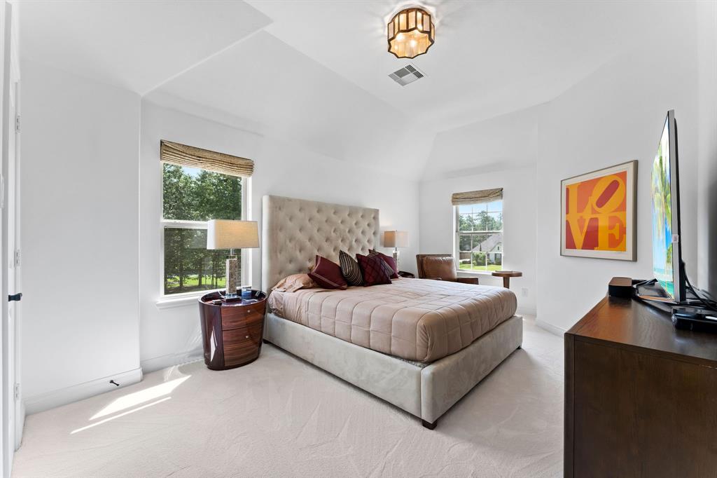 The adjoining Jack and Jill bedroom with designer upgraded light fixture - which is the same throughout the home and most closets.
