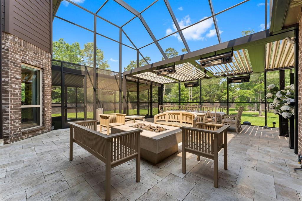 Another view of the outdoor living area and dog run.