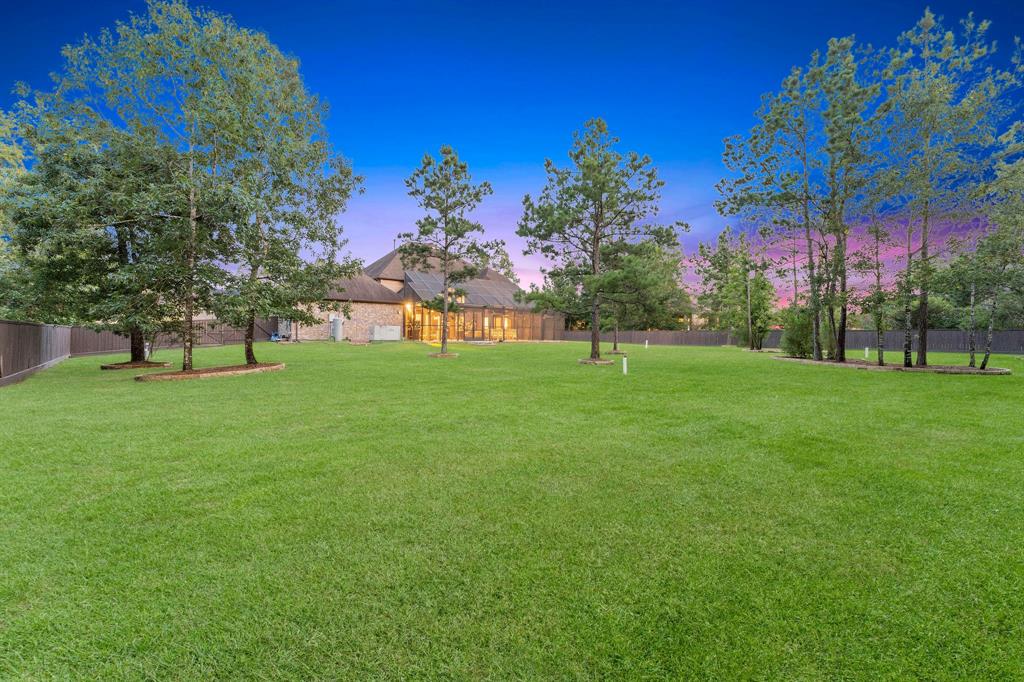 The home includes a whole home generator, water well, outdoor mosquito system, water softener, and brand new Navien tankless water heater with a nebulizer. The water heater was installed in May of 2023. The backyard is completely private from neighbors.