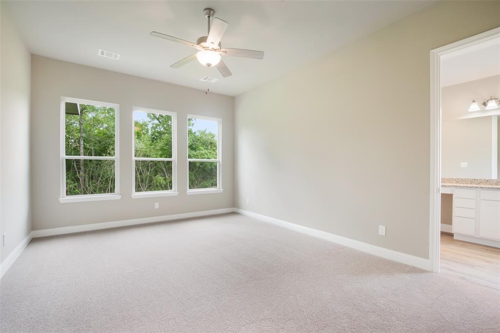 Lots of natural light in this primary bedroom.