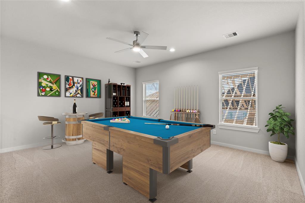 Come upstairs and enjoy a day of leisure in this fabulous game room This is the perfect hangout spot or adult game room, this space features plush carpet, high ceiling, recessed lighting, custom paint and large windows with privacy blinds.