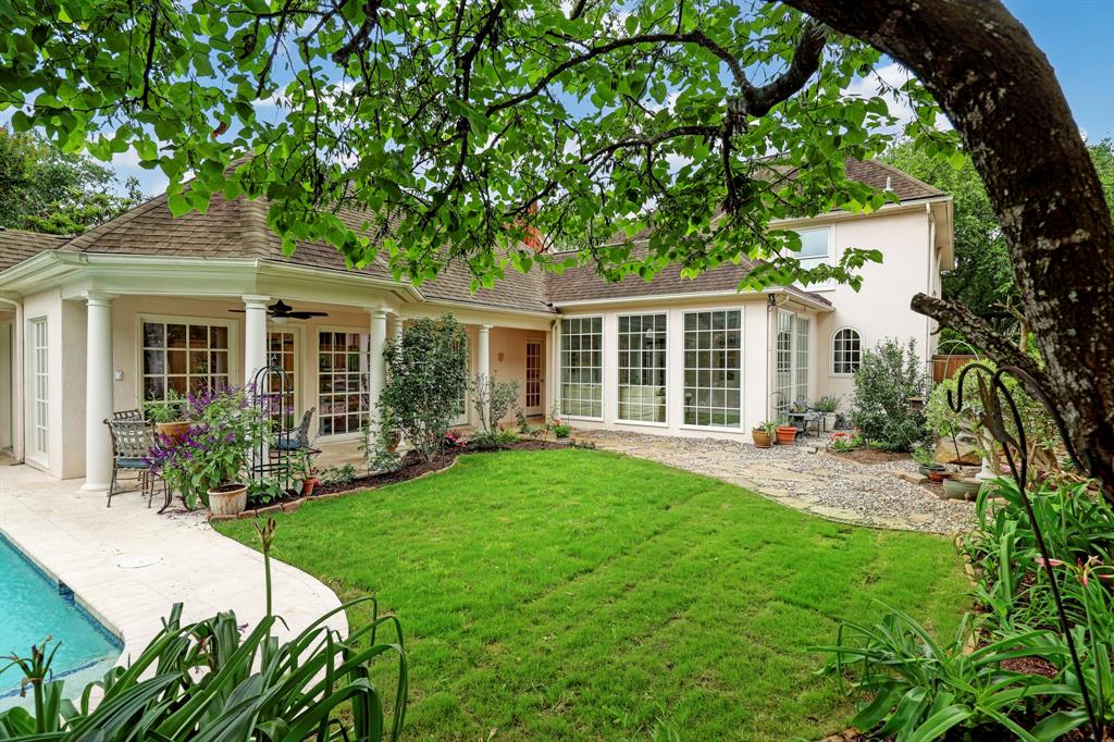 SHOWINGS START @ THURSDAY OPEN HOUSE 12-2PM.  With it’s strong roof lines and French country architectural features, this jewel of a property is nestled on a tree-lined street in Blvd Oaks and boasts beamed ceilings, plaster walls, recent windows & doors, formal living with French fireplace, dining room with views of French design gardens, phenomenal kitchen with Sub Zero, gas range & cooktop, wall-ovens, butcherblock counters, stunning family room with floor to ceiling windows overlooking the gardens, statuary, pergola, and pool. Perfectly located, a separate Guest House was built in 2009 with 692 sf per HCAD and has a 2 story living area, private bedroom, full bath, loft and lots of storage. You will find a summer kitchen adjacent to the guest house with covered terrace poolside. Enjoy the cozy pergola with backyard lawn, gardens, flagstone patios, pool and fountains. Main house is 3 bedrooms, 2.5 baths. Guest house 1 bedroom, 1 bath. Pool bath located off the utility room.