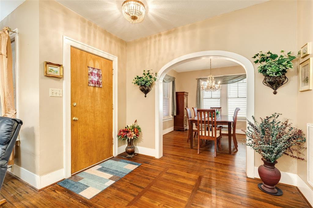Step in to the original hard wood floors and spacious rooms in this 1935 cottage.