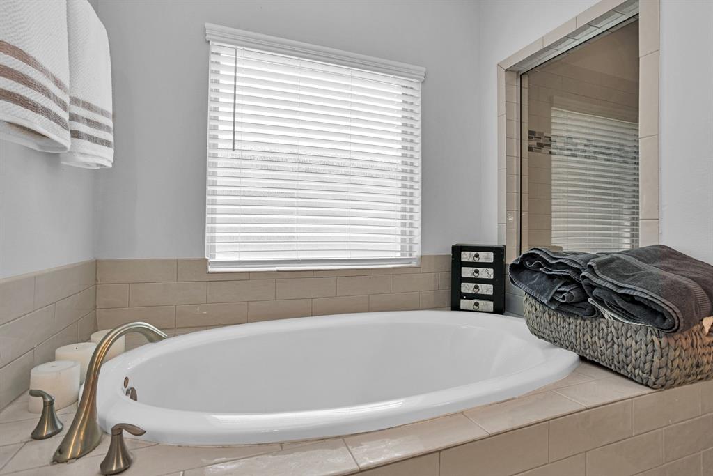 Soaking Tub and Separate Walk-in Shower.