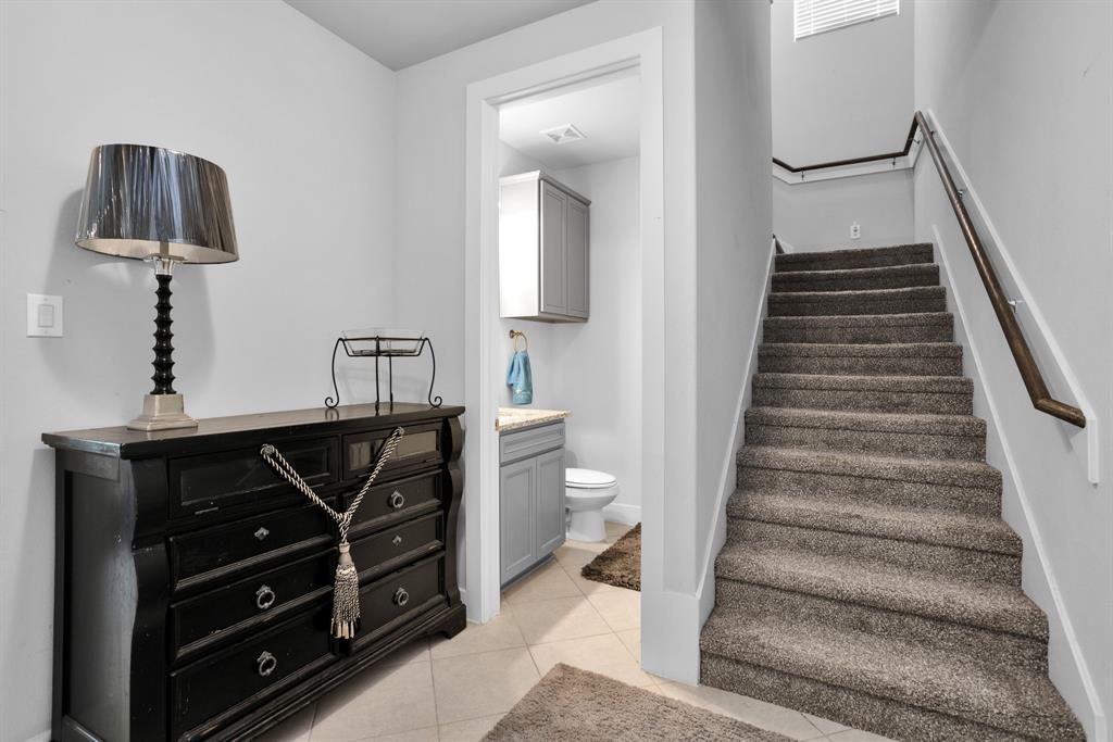 Half Bath on the Left of the Stairwell.
