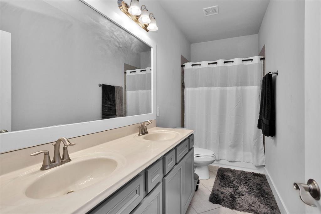 Hall Bath with Two Vanities.