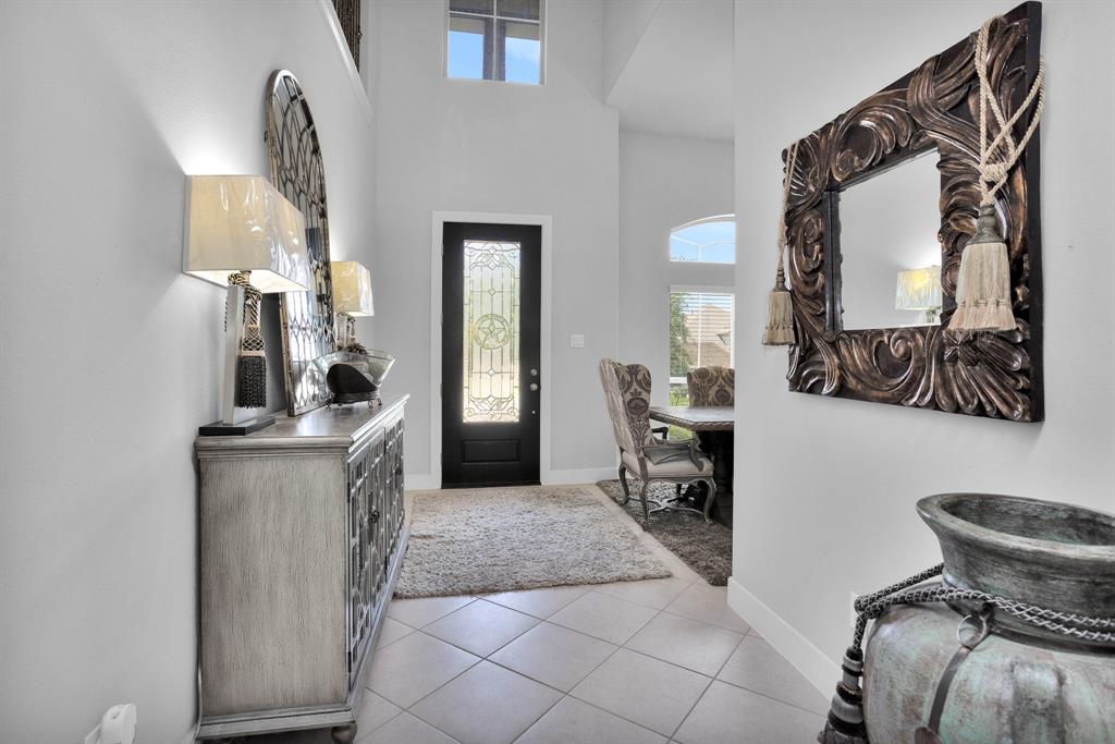Front Entry. The First Floor Features Soaring Ceilings throughout.