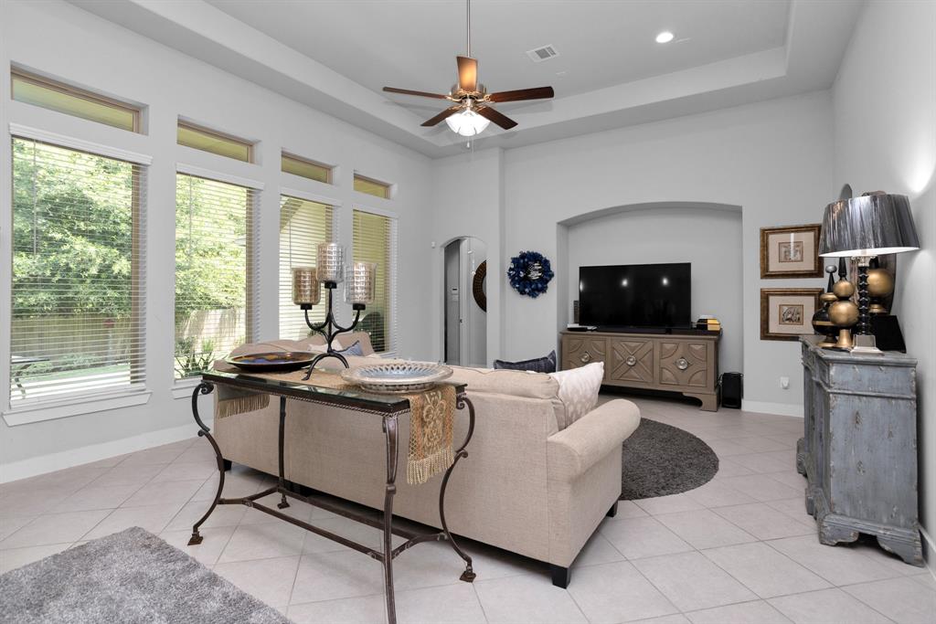 Huge Living Room with Bump-outs, Niches, Transom Windows and Vaulted Ceilings.