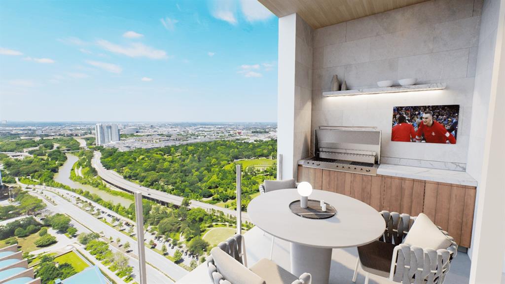 Savor the captivating uptown view from the balcony with a summer kitchen. Enjoy alfresco dining and entertaining with an outdoor kitchen while soaking in the mesmerizing cityscape that surrounds you.