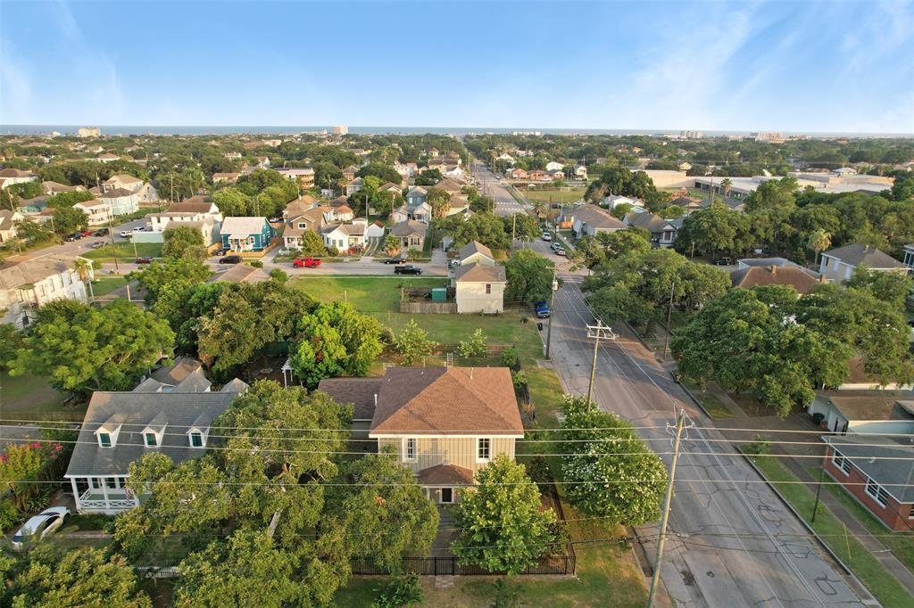 An aerial view of the property highlights the location of this large corner lot in Galveston\'s midtown district - just two block south of Broadway, 1.5 miles to the Strand District, and 14 blocks north of the sandy shores of Galveston Beach near the Pleasure Pier.