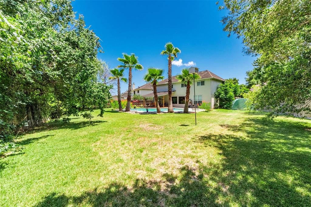 A Rare Find!!  Incredibly unique 15,290 sq.ft. private lot with pool, hot tub, covered patio, and mature trees in the quiet neighborhood of Rustic Oaks with low tax rate, low HOA and zoned to CCISD.
