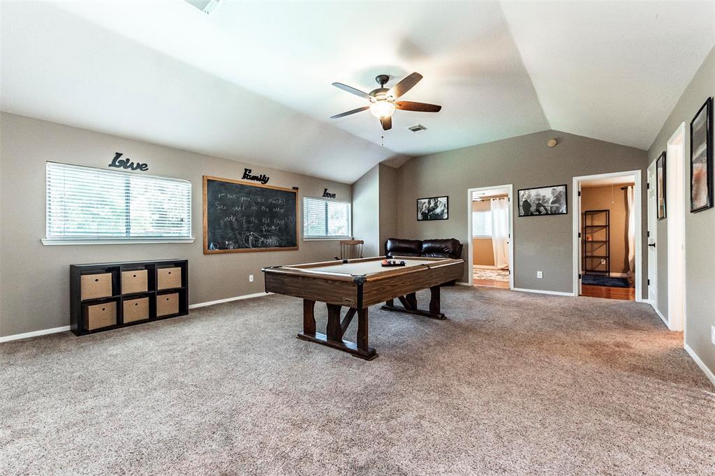 Huge game room on 2nd floor with vaulted ceiling and updated carpet/padding and memory foam.