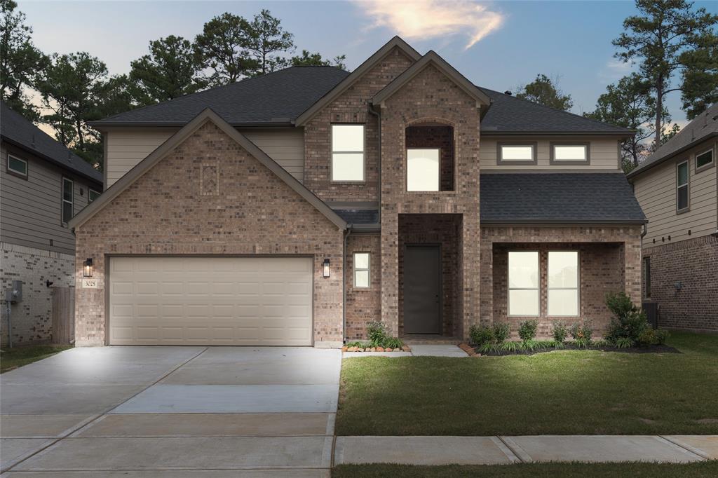 Welcome home to 3025 Mesquite Pod Trail located in Barton Creek Ranch and zoned to Conroe ISD.