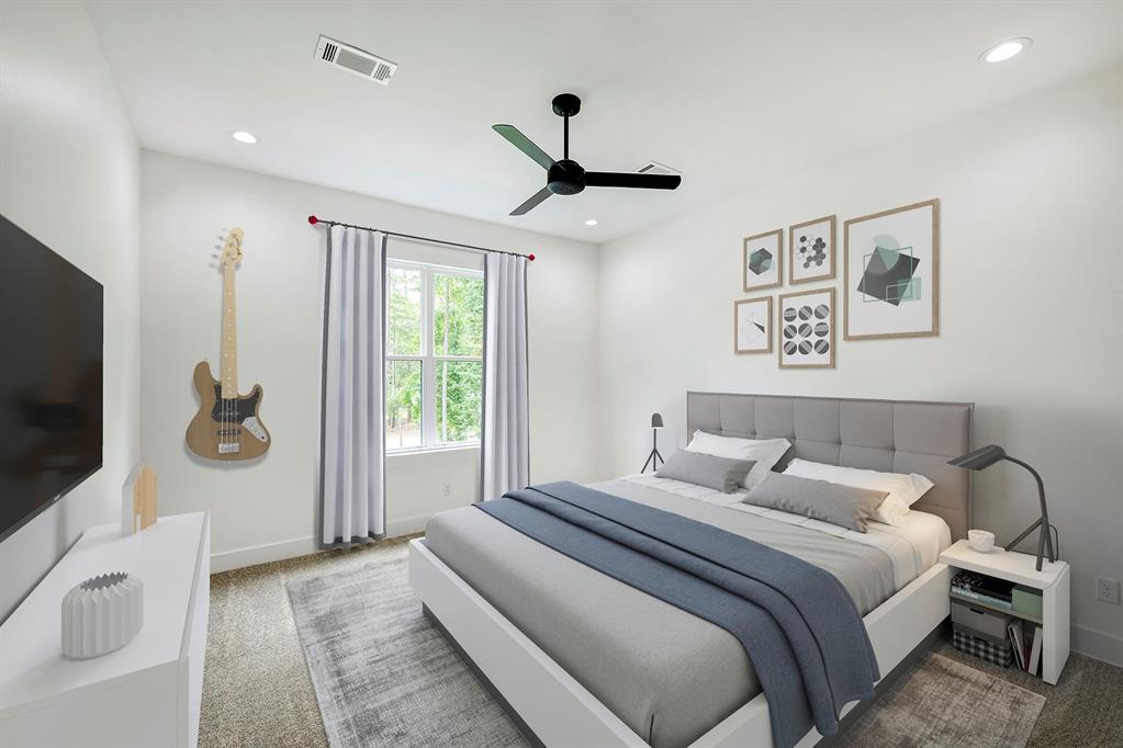 All secondary bedrooms include a walk-in closet, modern ceiling fan, and dimmable lighting. This bedroom is located upstairs, has an attached full bath, and is virtually staged.