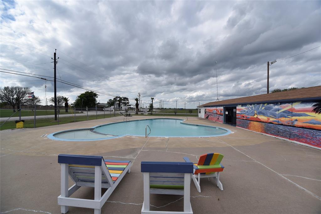 Community swimming pool is less than a 1 block walk away from this beautiful property.