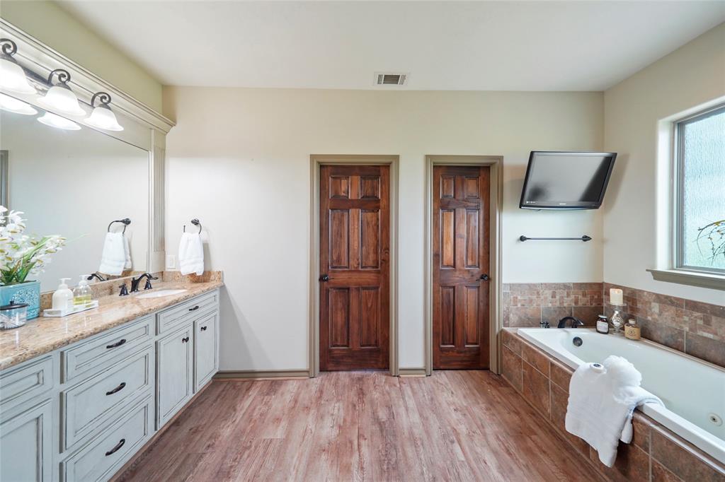 Large Primary Bathroom with Dual Closets, Jetted Tub and Shower!