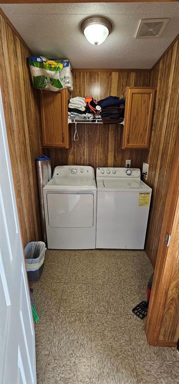 Laundry room in-house with clothes bar and full size washer and dryer - included.