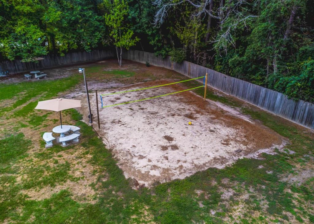 Competition-sized sand volleyball court