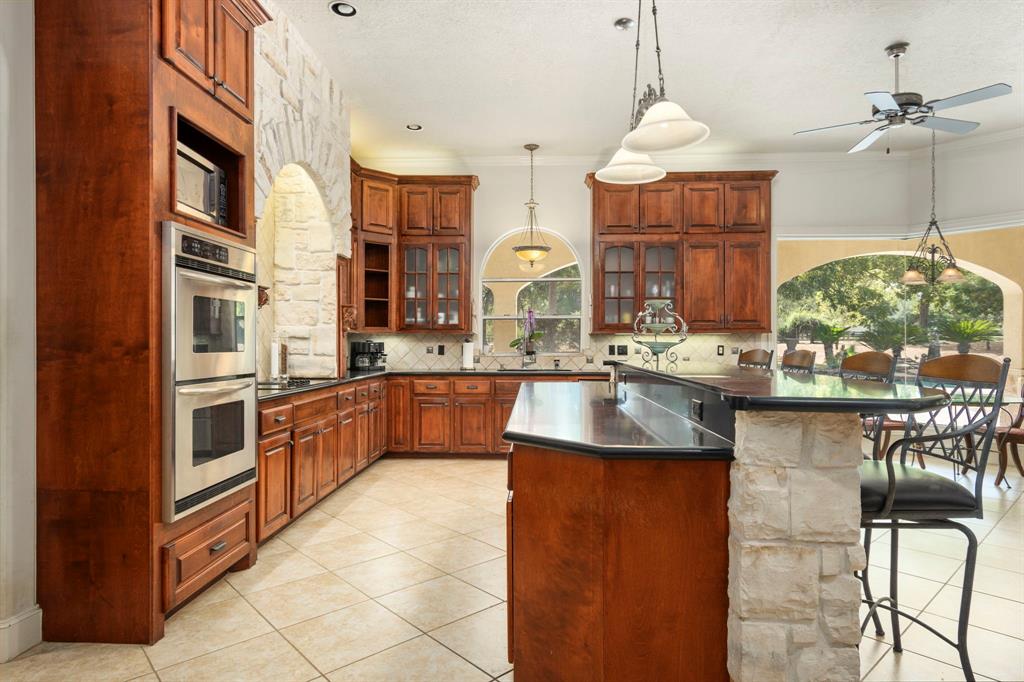 This Tuscan style kitchen is perfect for entertaining those that you love. Double ovens, high end dishwasher, Subzero refrigerator make it all the more enjoyable to prepare a great meal for everyone.