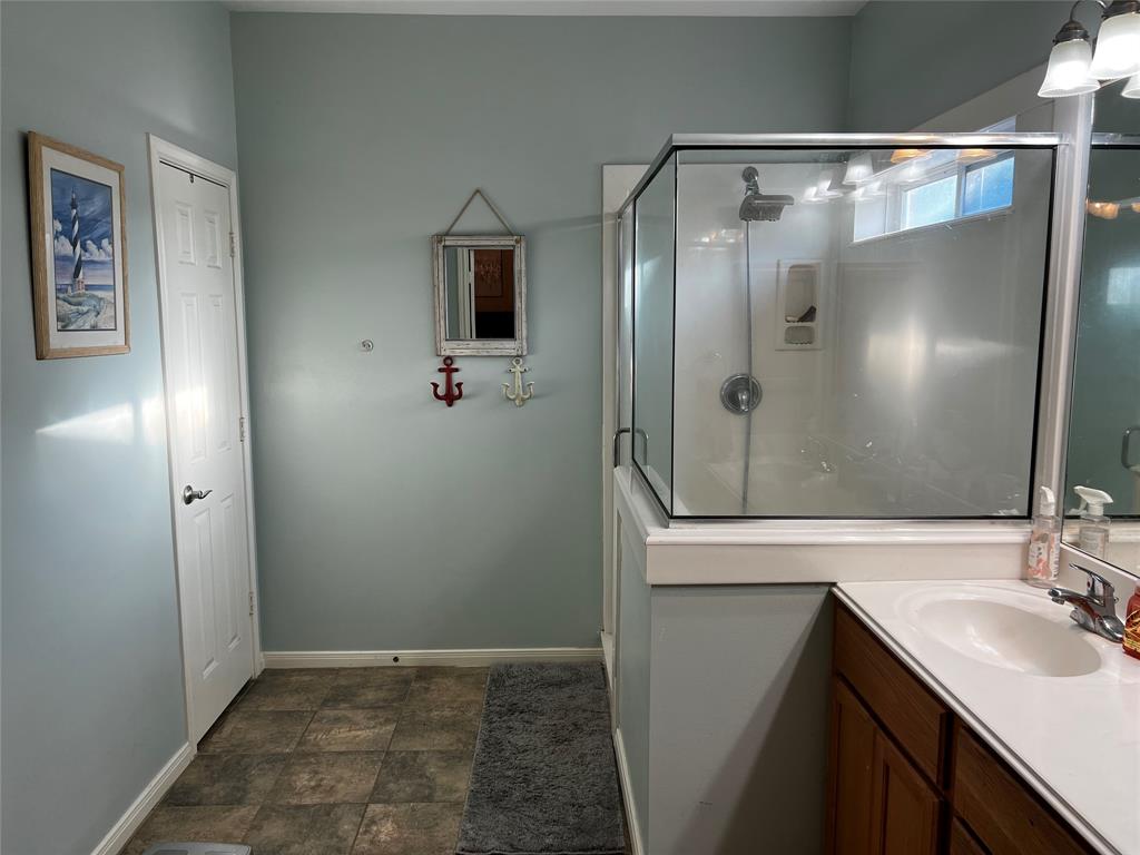 Double Sinks in the primary bathroom as well as a huge shower.