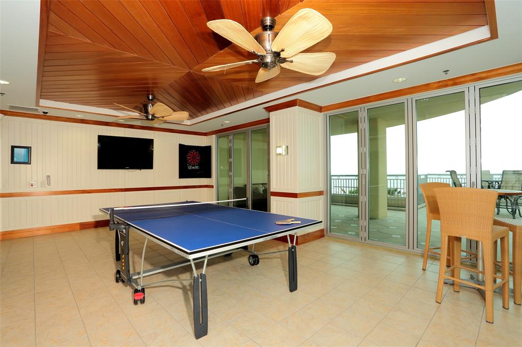 Take a break from the sun in the Ping pong game room with flat screen tvs for your enjoyment.