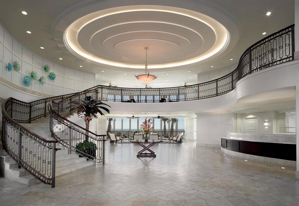 The lobby is a two-story masterpiece, boasting breathtaking views and complemented by a 24/7 concierge service that adds an extra touch of luxury and convenience to your experience.
