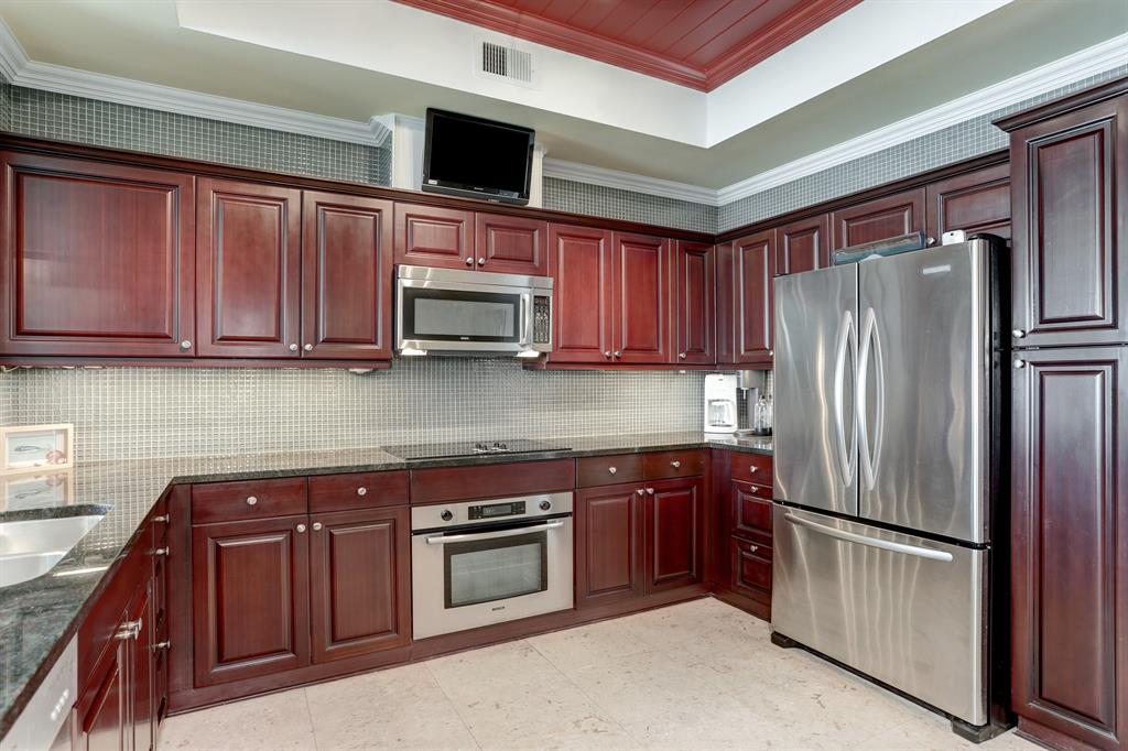 The Kitchen features sleek stainless steel appliances and elegant granite countertops.