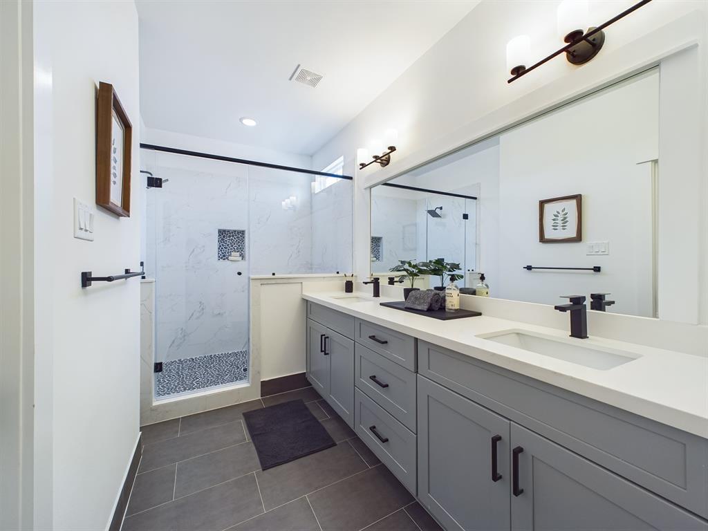 MOVE-IN READY! Offering a beautiful primary bathroom with a walk-in shower and double sink vanity. FINISHES & FLOOR PLANS WILL VARY!
