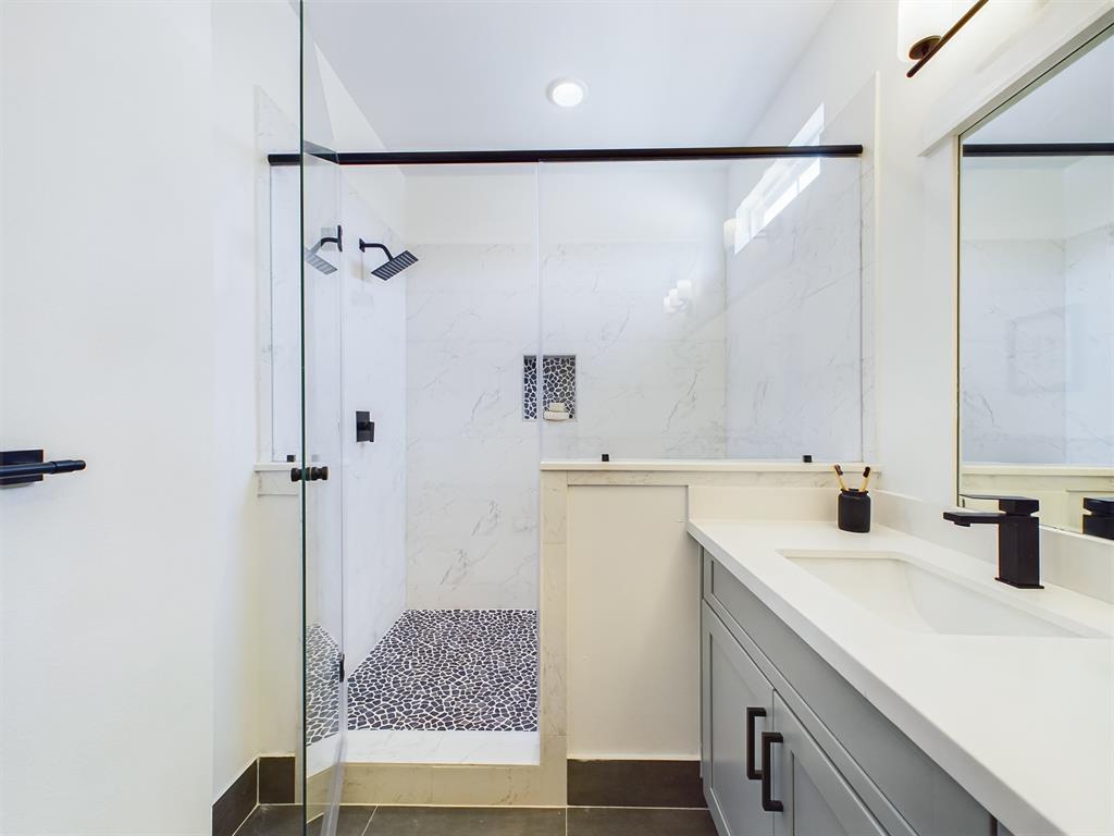 MOVE-IN READY! Offering a beautiful primary bathroom with a walk-in shower and double sink vanity with quartz countertops. FINISHES & FLOOR PLANS MAY VARY!