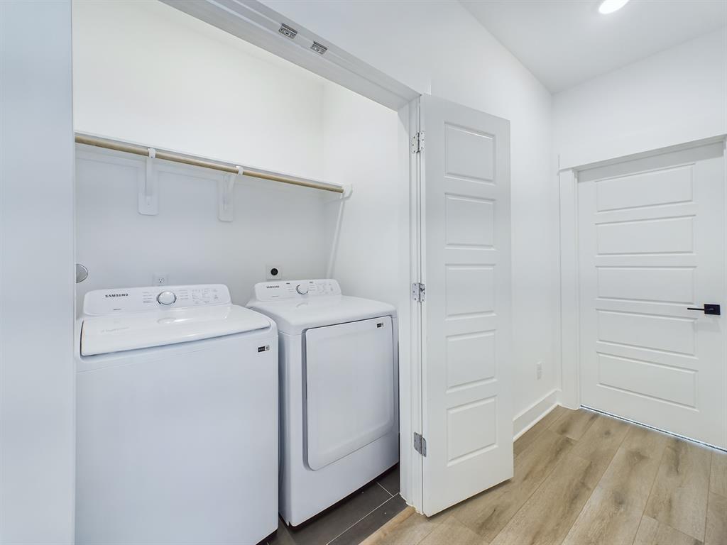 The laundry room is conveniently located on the second floor.