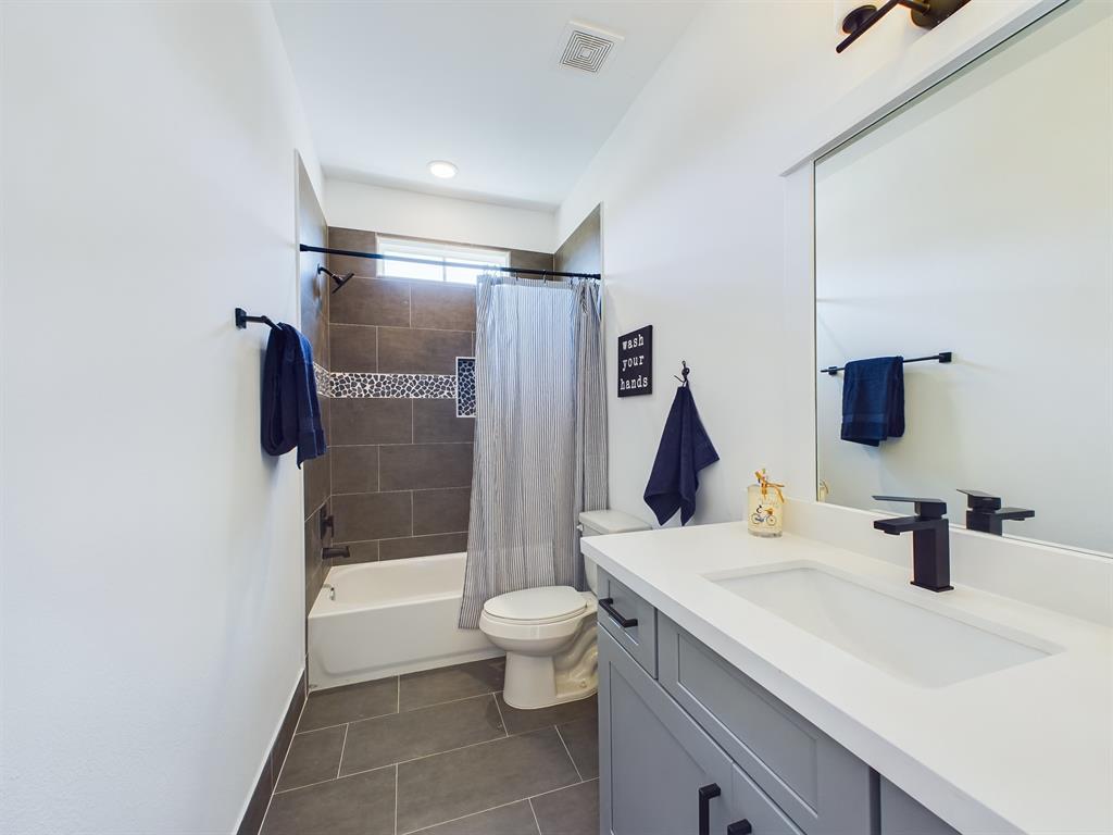 MOVE-IN READY! Full secondary bathroom with tub & shower head. FINISHES & FLOOR PLANS WILL VARY!