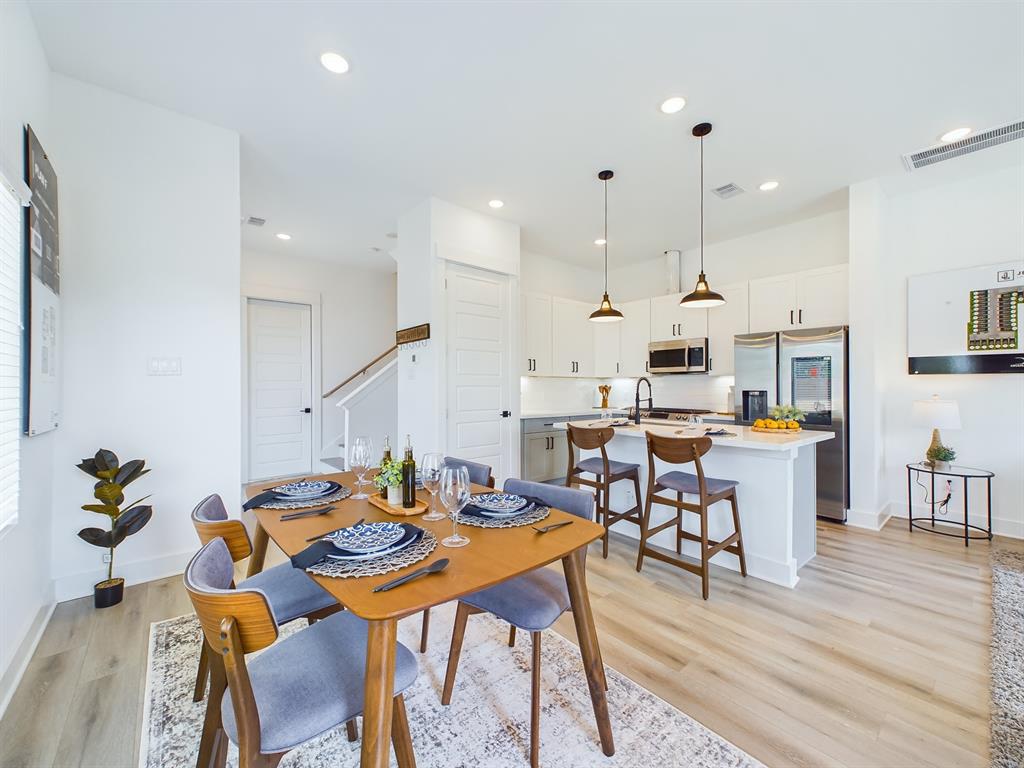 MOVE-IN READY! High-end interior finishes including quartz countertops, big kitchen island, stainless-steel appliances, upgraded cabinets with soft close drawers. FINISHES & FLOOR PLANS WILL VARY! Ceiling fans are not included!