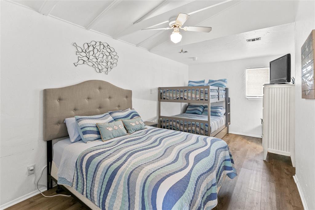 Bedroom #2 with vaulted ceilings.