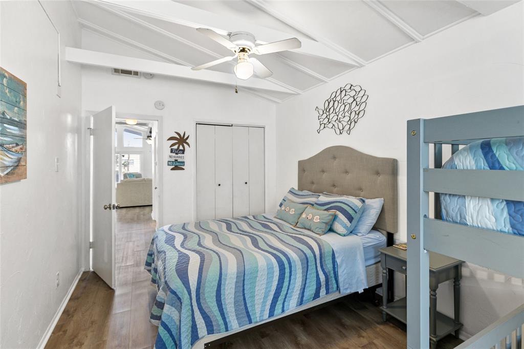 Bedroom #2 with vaulted ceilings.