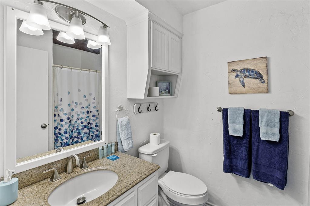 Guest bathroom with shower only.