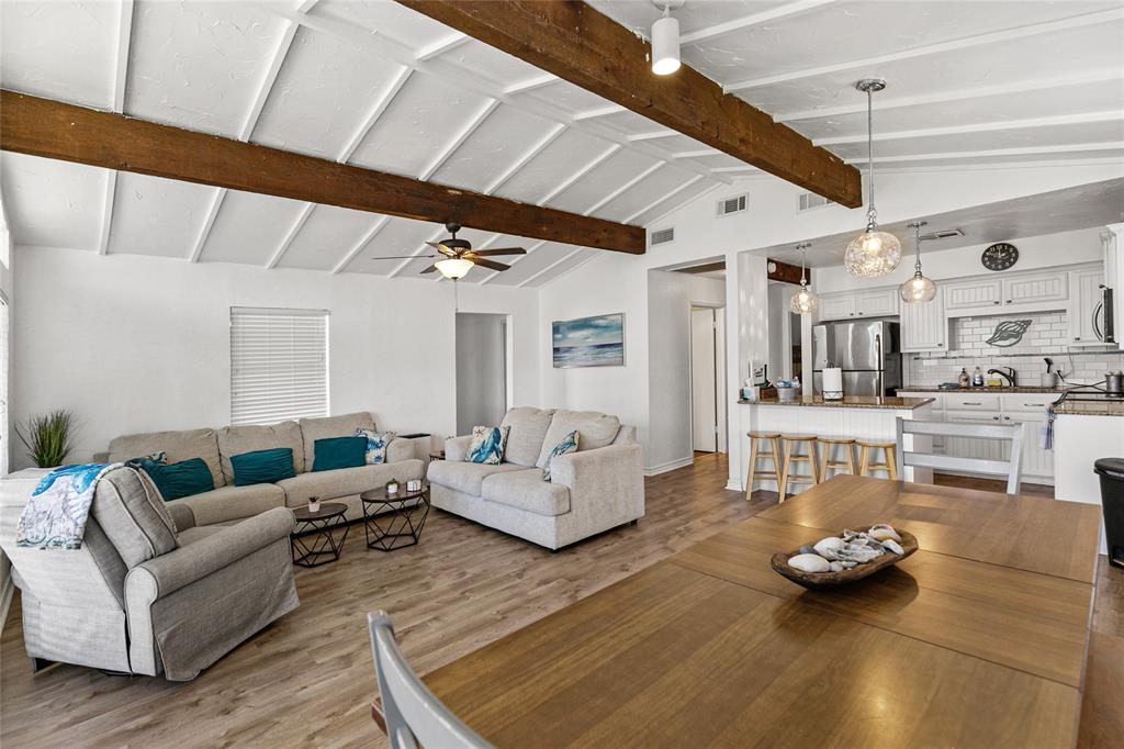 Beautifully vaulted ceilings in the living and ding room.