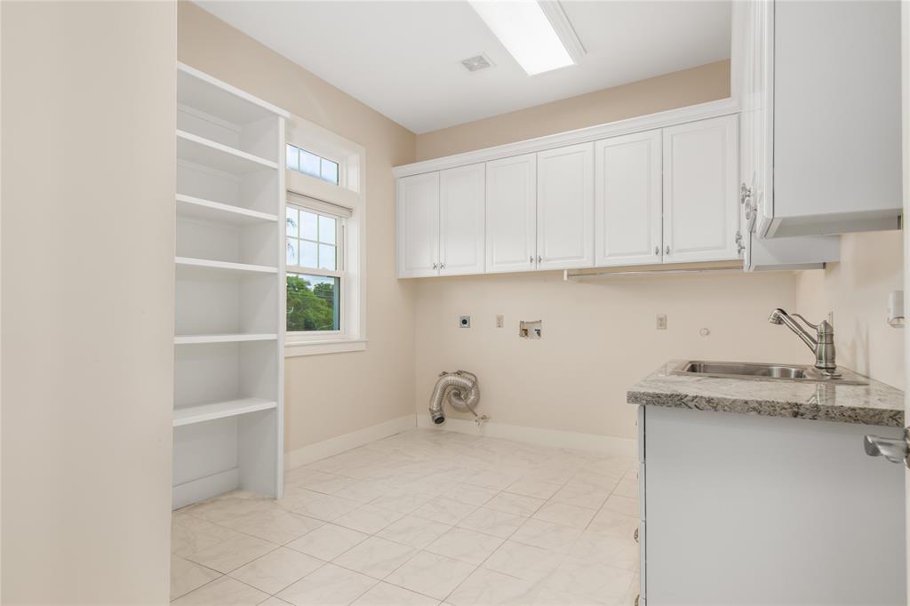 Large Laundry room, with more storage not pictured.