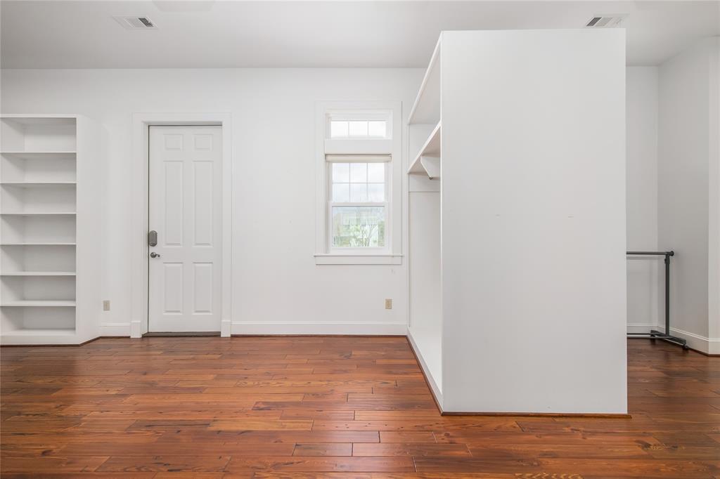 Door from closet to large extra room.