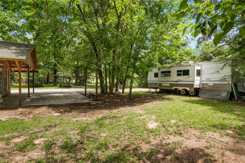 RV\'s area allowed on the property. Lots of parking all the way around grounds.  this 1+ acreage.