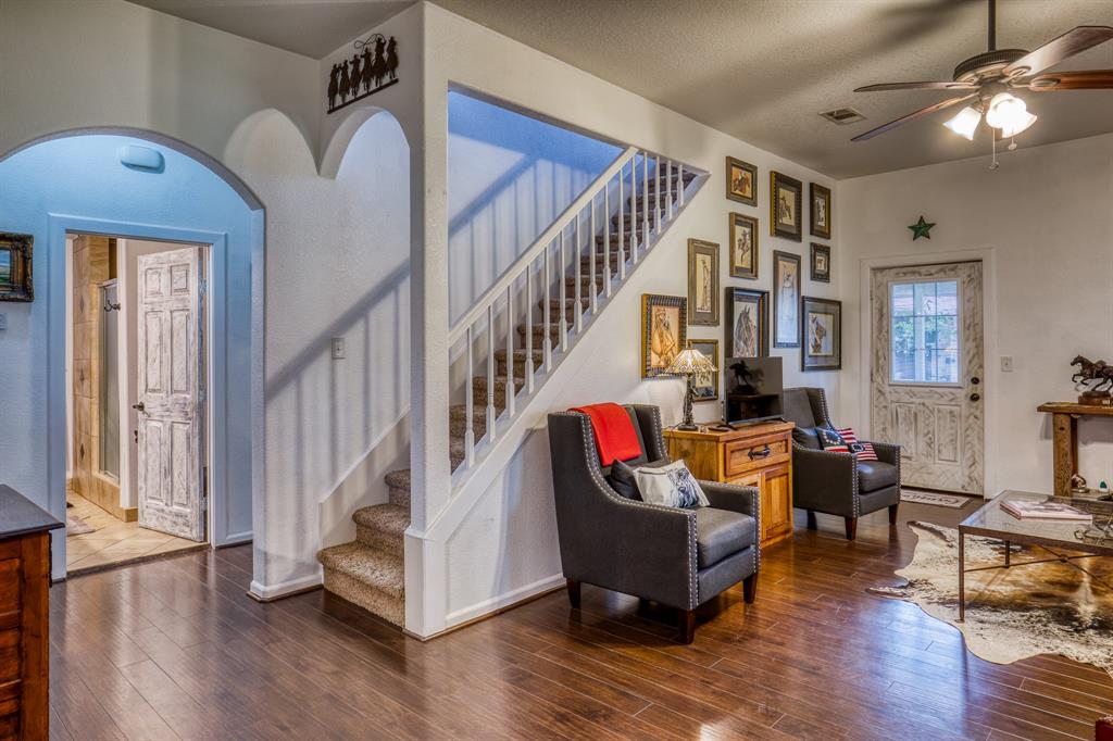 This split level offers easy access to two bedrooms & a full bath downstairs with a larger bedroom/game room/loft & a second full bath upstairs.