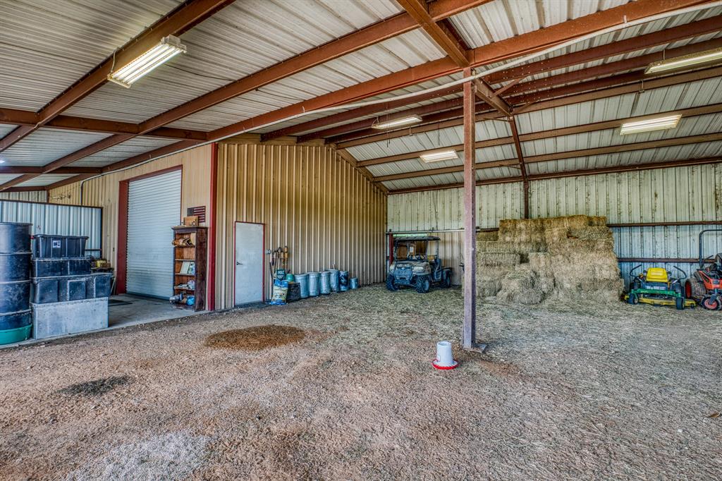 Store your heavy equipment, hay & feed in the 1st barn.