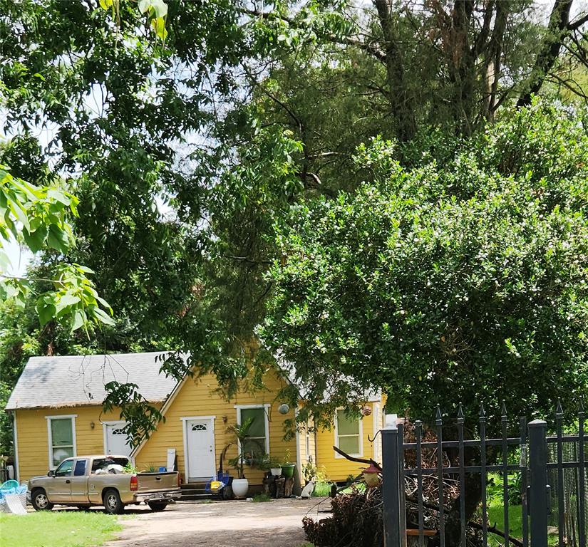 Just through the gorgeous Iron gate, this property begins, large pecan and other trees provide so much shade for these summer days.