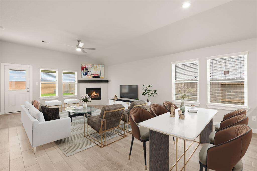 The open concept living room and kitchen makes for a great way to keep the party going and never miss a beat!