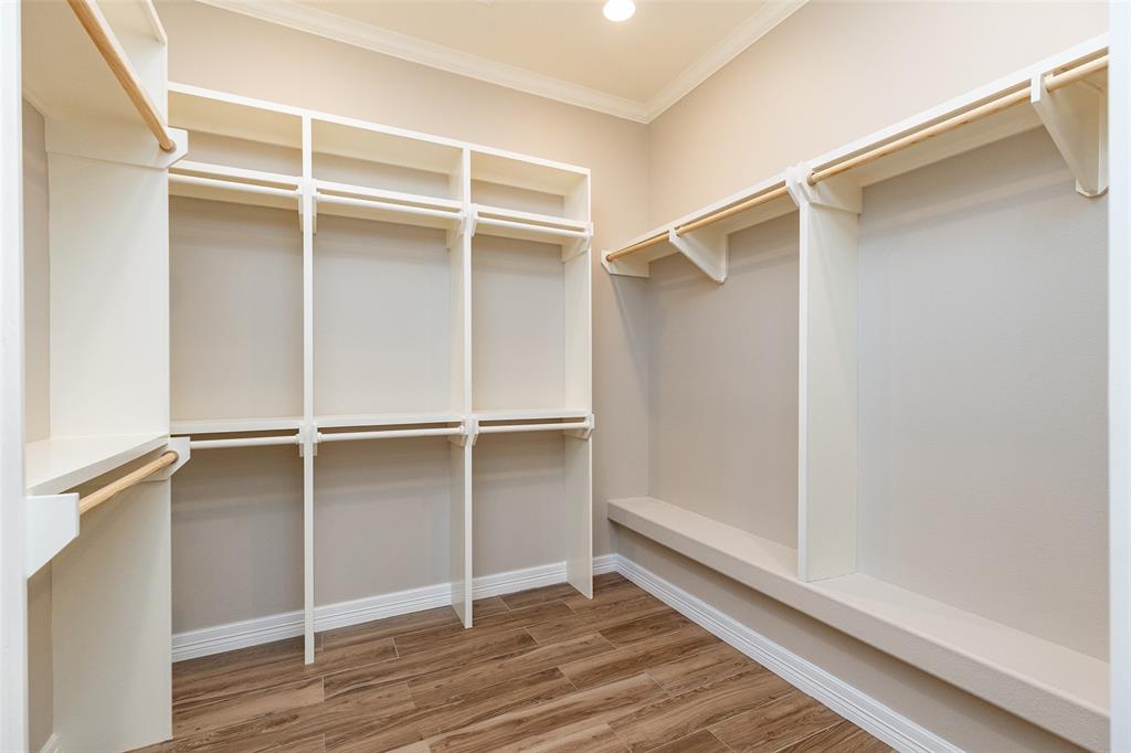 Large Primary Closet with built-ins
