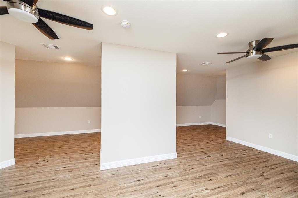 Large room upstairs, expanding length of the home. Would be great for a Media Room, Game Room, Craft Room