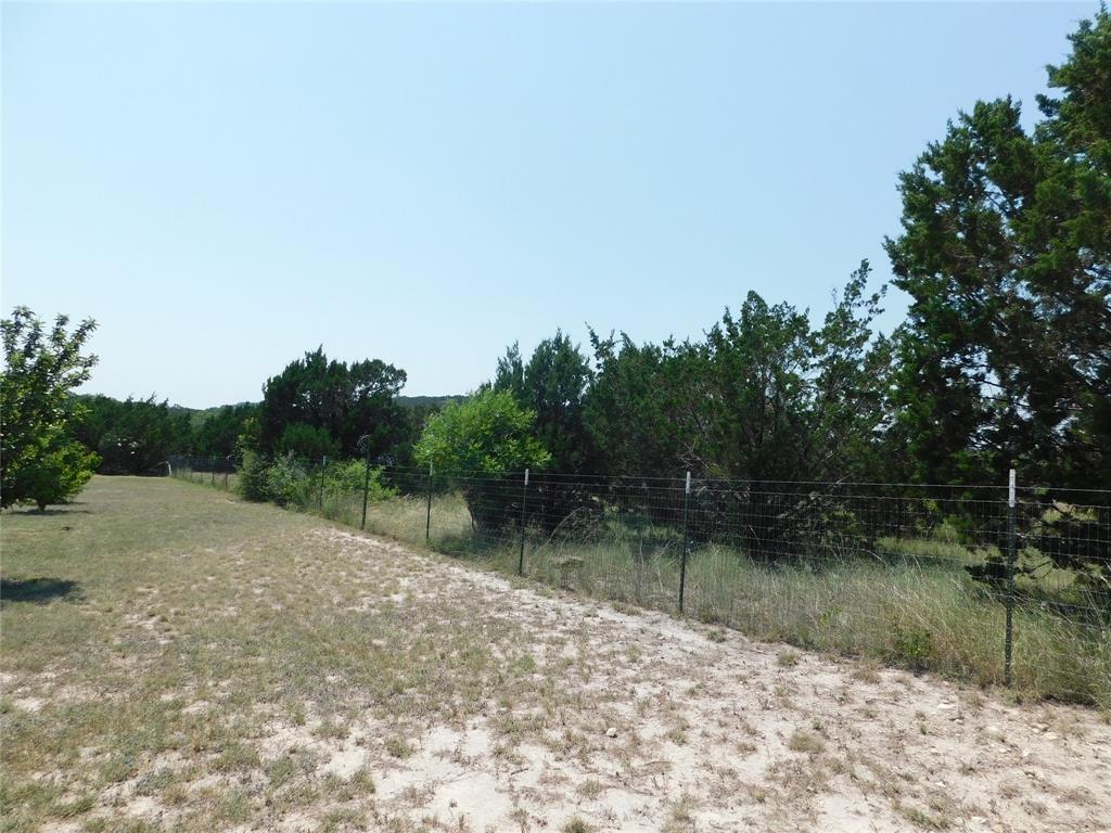 Fenced, view of hill country acreage.