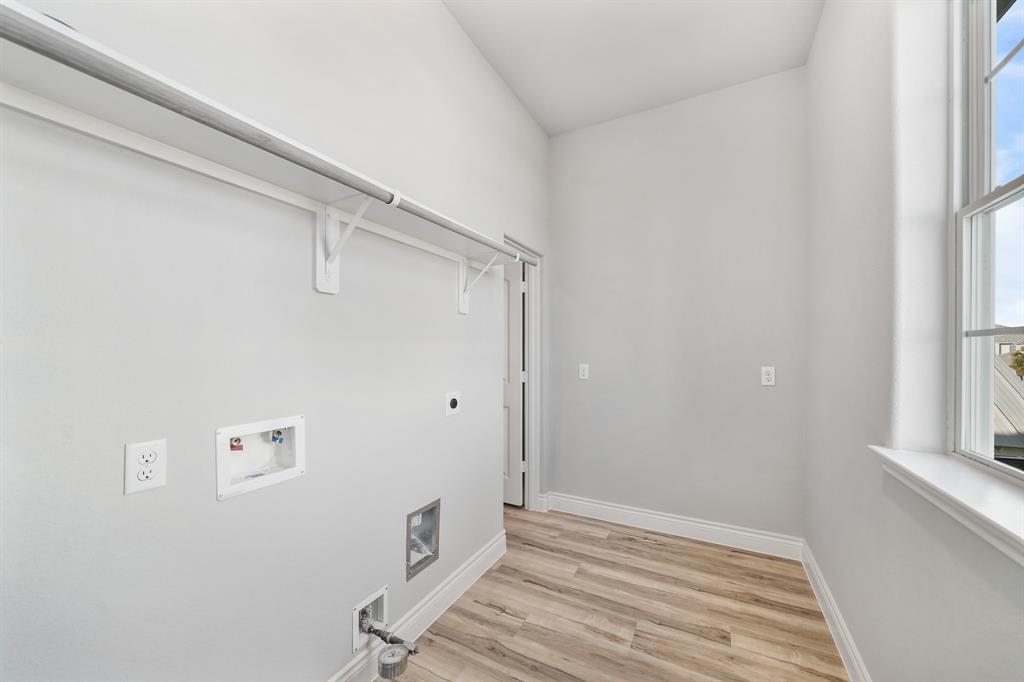 Check out this laundry room! It is attached to the primary closet for ultimate convenience!