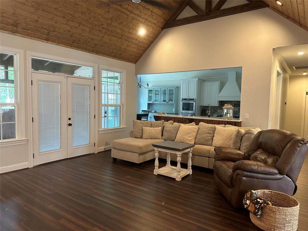 Spacious living room with cathedral ceilings